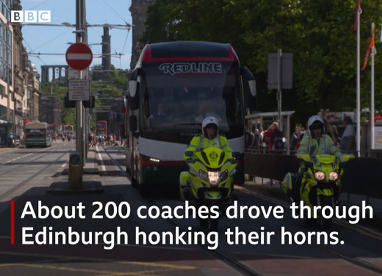 200 coaches drove through Edinburgh honking their horns for hope